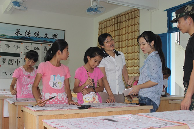 团县委到罗顺小学观摩暑期国防义教活动